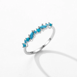 Minimalist S925 sterling silver ring featuring turquoise stones in wave pattern