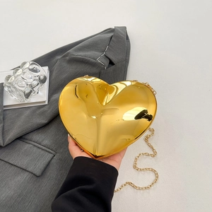 Golden heart shaped acrylic evening clutch bag with metal chain strap for women