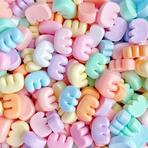 Colorful resin letter beads in macaron tones for DIY hair accessories and crafts