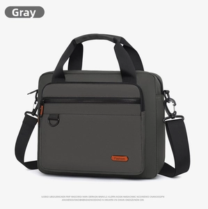 Detail of gray waterproof nylon business bag with top handle and fashion logo