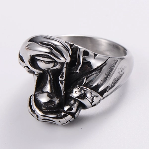Macro detail of silver punk skull engraving on 304 stainless steel men's ring