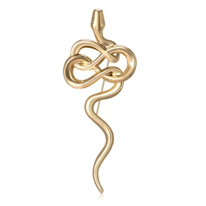 Vintage golden snake brooch with polished alloy finish on white background