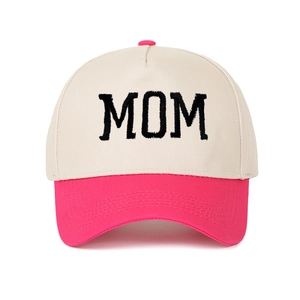 Close-up of MOM letter embroidery on pink and off-white trucker baseball cap