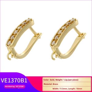 Detail of 18K gold plated brass U-shaped earring hooks with cubic zirconia for DIY jewelry