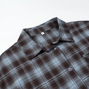 Women's casual plaid shirt with classic collar and blue-brown check pattern in flannel texture