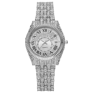 Macro detail of silver quartz watch featuring full diamond setting and Roman numerals