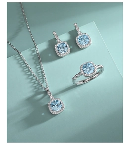 Detail of S925 silver jewelry set featuring square blue stones and sparkling zircon borders