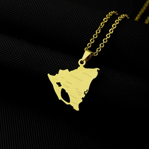 Golden Nicaragua map pendant necklace in polished titanium steel with detailed engravings