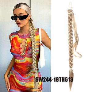 Macro detail of 80cm braided synthetic ponytail extension with blonde highlights