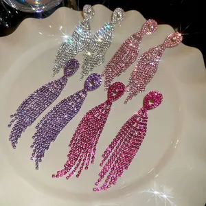 Elegant silver tassel earrings with sparkling rhinestones in four vibrant colors