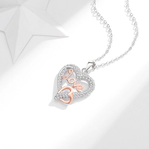 Elegant S925 sterling silver heart pendant necklace with Love carving and white zircons