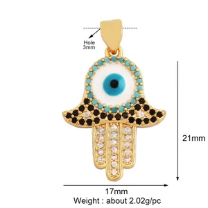 Macro shot of Hamsa Hand jewelry pendant with dimensions 21x17mm and blue evil eye detail