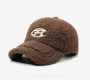 Side view of a brown lamb wool baseball cap featuring high-quality letter R embroidery