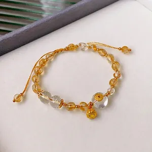 Elegant citrine beads bracelet with gold lotus pendant and adjustable cord