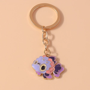Detailed view of enamel koi fish keychain with golden ring and colorful scales