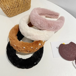 Set of four plush faux mink fur headbands in pink, cream, brown, and black colors