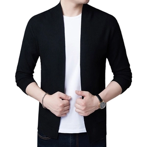 Detail of black knit cardigan texture and V-neck collar design on male model