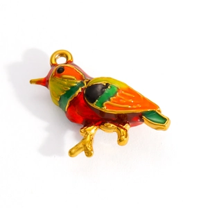 Detailed view of bird-shaped enamel pendant with multicolor finish on 18k gold frame