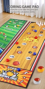 Detail showing scoring game pad set with soccer and bowling themes for kids' interactive play
