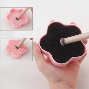 Detail showing various silicone cleaning textures and carbon sponge for makeup brushes