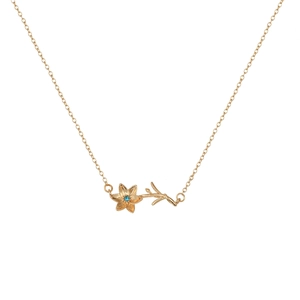 Golden flower necklace featuring a 3D floral pendant with a centered blue gemstone
