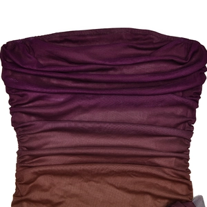 Detail shot of the tight pleats and gradient purple to brown fabric of the bodycon dress