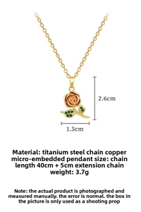 Detailed view of rose pendant necklace with green leaf and size dimensions labeling
