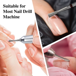 Close-up of alloy nail drill bits set removing cuticle and gel on a professional machine