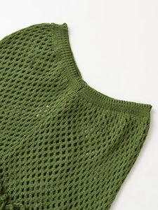 Detailed close-up of moss green crochet knit vest featuring openwork mesh texture and ribbed hem