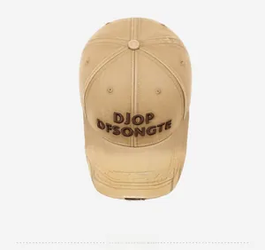 Detailed top view of khaki baseball cap with 3D letter embroidery and vintage distressed style