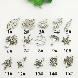 Set of 15 vintage silver alloy leaf and flower pendants for DIY jewelry making