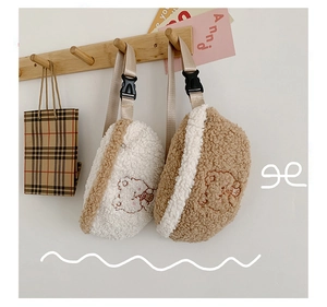 Detail of plush lamb wool waist bags with cute bear embroidery and khakis strap