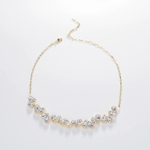 Elegant gold heart necklace featuring pear-cut rhinestones with rectangular link chain