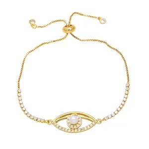 Pulsera ojo turco con perla y circones blancos, cadena dorada con cierre ajustable