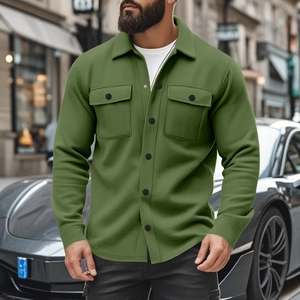Detail of army green slim fit jacket featuring dual chest pockets and button closure