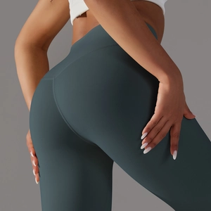Close-up of high-waisted yoga leggings featuring V-shaped back seam for butt lifting