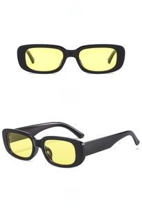 Detailed views of vintage rectangle sunglasses with black frames and yellow lenses