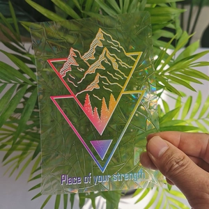 Rainbow suncatcher prism sticker with geometric mountain landscape and positive quote