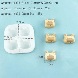 White silicone mold with four teddy bear cavities for chocolate or soap making