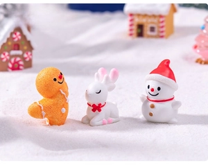 Miniature Christmas resin figurines set featuring gingerbread man deer and snowman