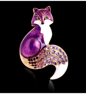 Macro shot of fox brooch with purple enamel finish and gradient crystal rhinestones