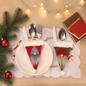 Gnome-style Christmas cutlery holders in red and brown felt for festive table decor