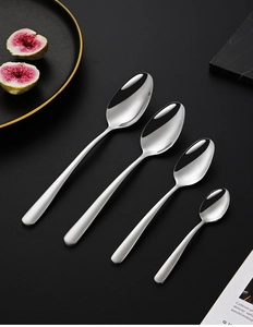 Polished 304 stainless steel spoons in various sizes on a dark luxury background