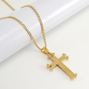 Close-up of 18K gold-plated stainless steel multilayer cross pendant necklace for men