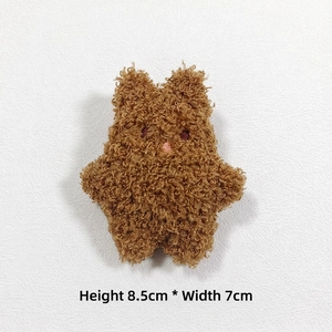 Sherpa fleece cartoon bear plush accessory measuring 8.5cm x 7cm in caramel brown