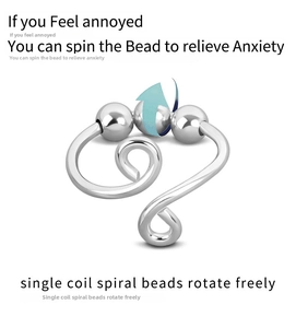Detail showing an adjustable anxiety relief ring with sliding beads to reduce stress