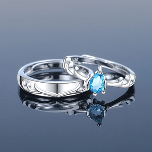 Adjustable S925 silver couple rings set with blue teardrop zircon and antler design