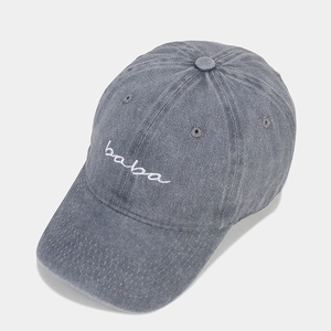 Vintage washed dark grey cotton baseball cap with white baba embroidery in a 45-degree view