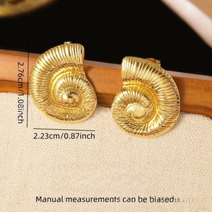 Detailed macro view of 18K gold plated stainless steel seashell stud earrings for women