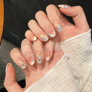 Faux ongles peinture à l'huile avec fleurs violettes jaunes et dégradé pailleté argent
